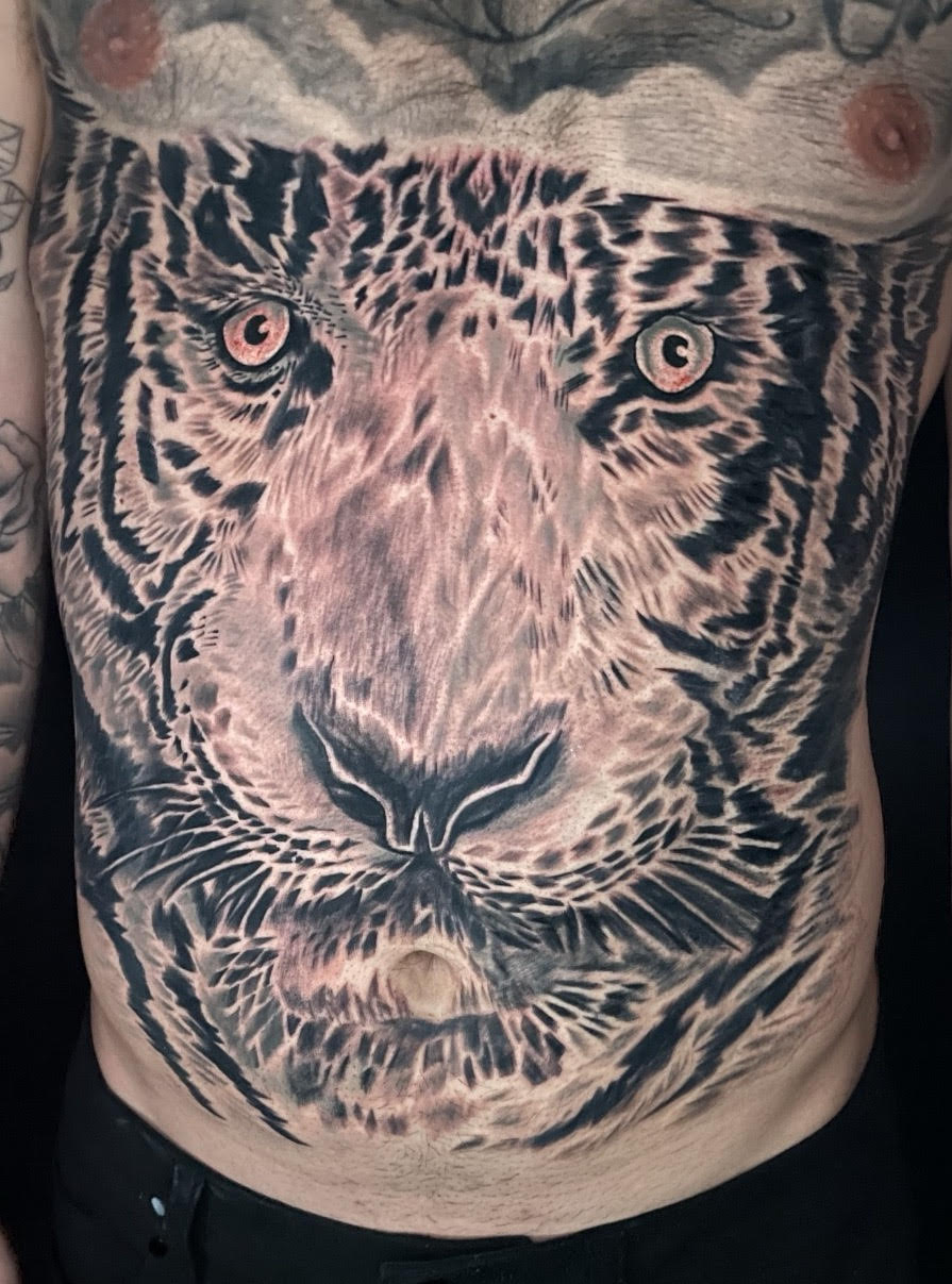 Brian, tattoo artist specializing in color and realism at Rockstar Tattoo